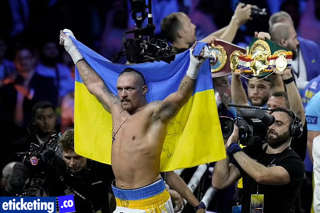 Usyk After defeating Joshua holding the flag of his country