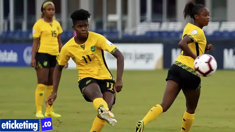 Jamaica Women  Soccer Player hitting the ball for a goal